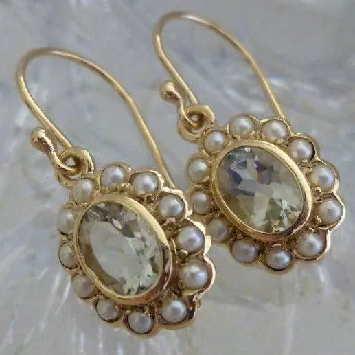 Elegant Pearl Earrings with Faceted Crystals and Delicate Setting