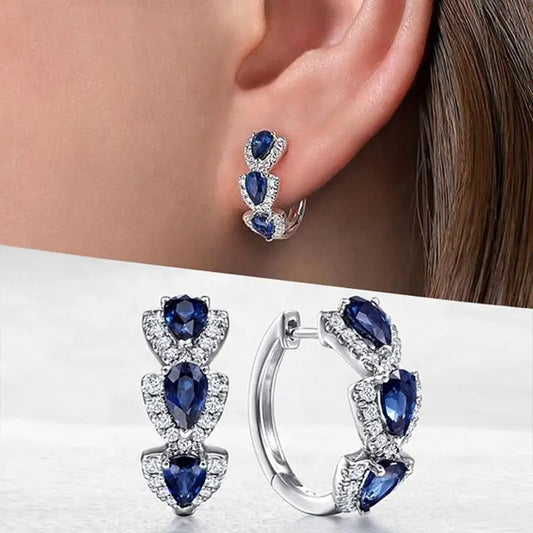 Elegant teardrop-shaped earrings with sparkling cubic zirconia and coloured crystals
