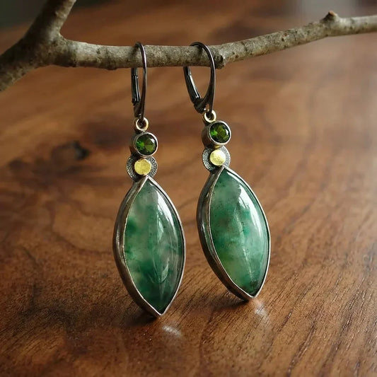 Vintage earrings made from green natural stone with an elegant marcasite accent