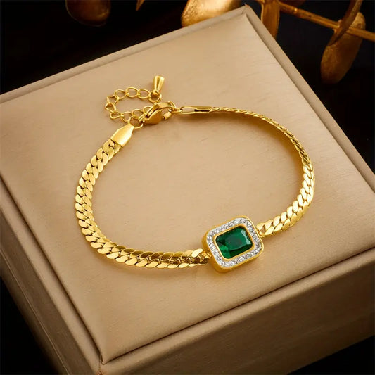 Elegant snake-chain bracelet with emerald-green cubic zirconia stones