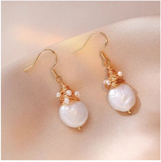 Elegant earrings with freshwater pearls and wire detailing