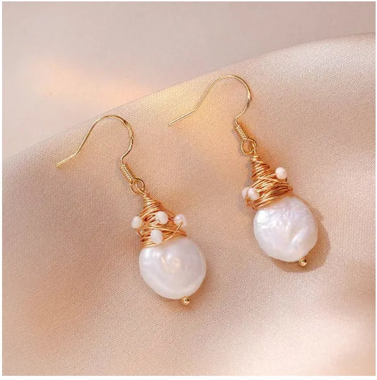 Elegant earrings with freshwater pearls and wire detailing