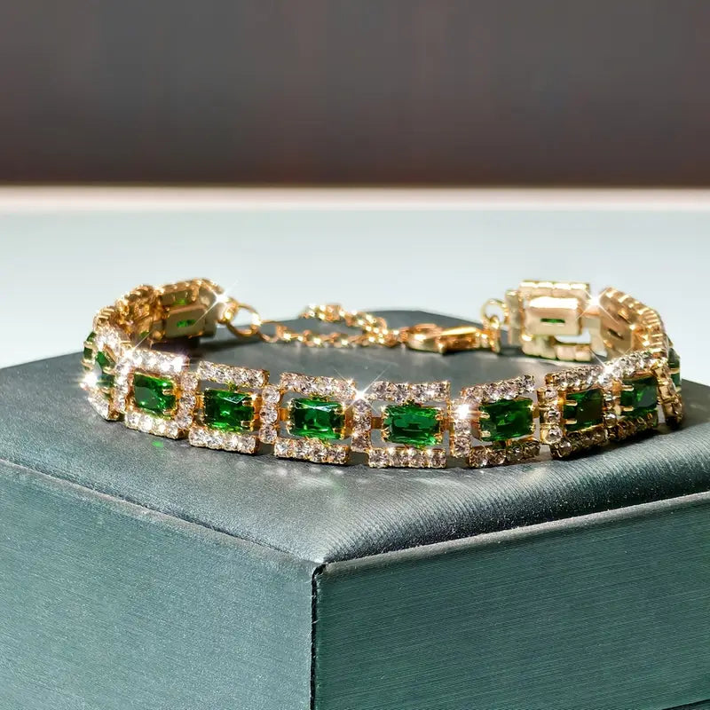 Glamorous bracelet with emerald-green cubic zirconia and sparkling crystals