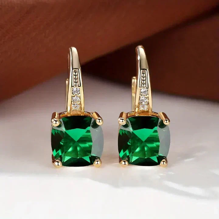 Sparkling hoop earrings with cushion-cut cubic zirconia