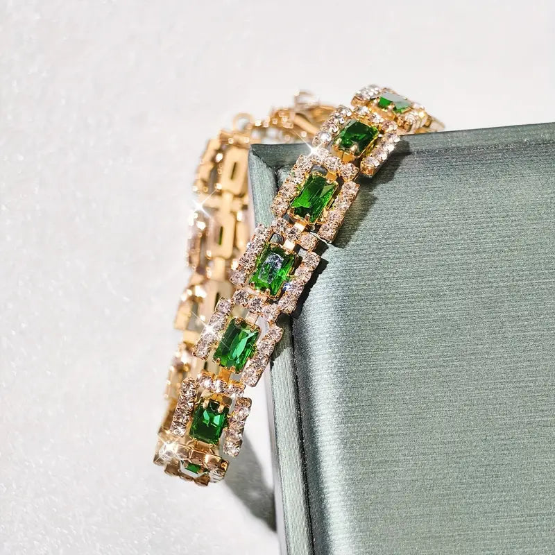 Glamorous bracelet with emerald-green cubic zirconia and sparkling crystals