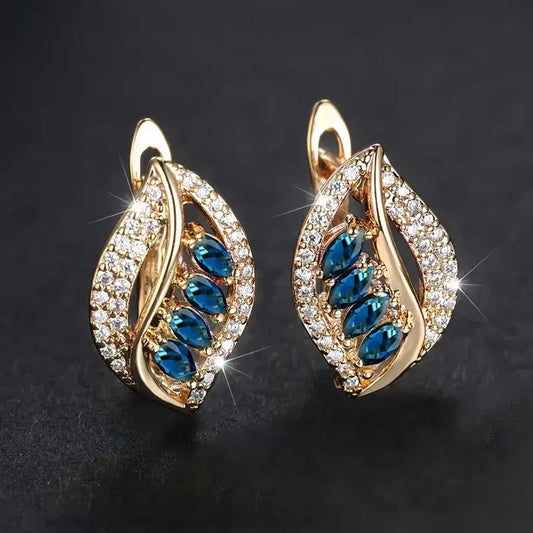 Elegant earrings with blue sapphires and sparkling cubic zirconia