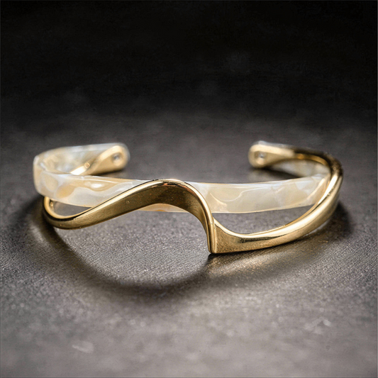 Modern bracelet with a wave-pattern design in mother-of-pearl and metal