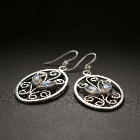 Silver colored moonstone earrings with floral hooks