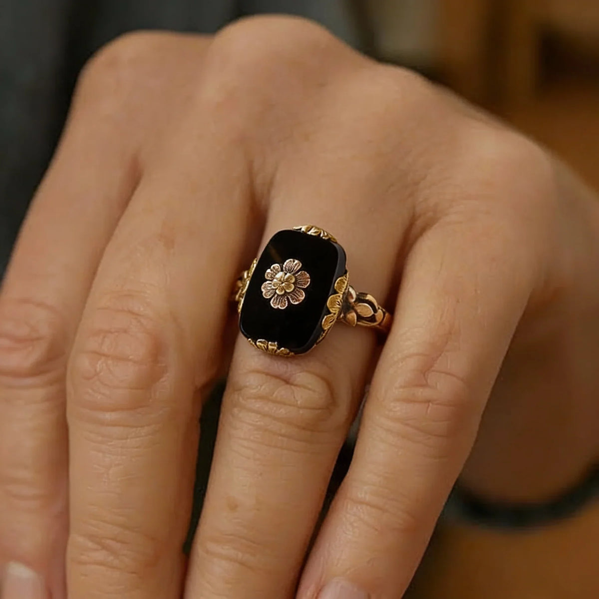 Vintage Ring with Black Stone and Gold Floral Details