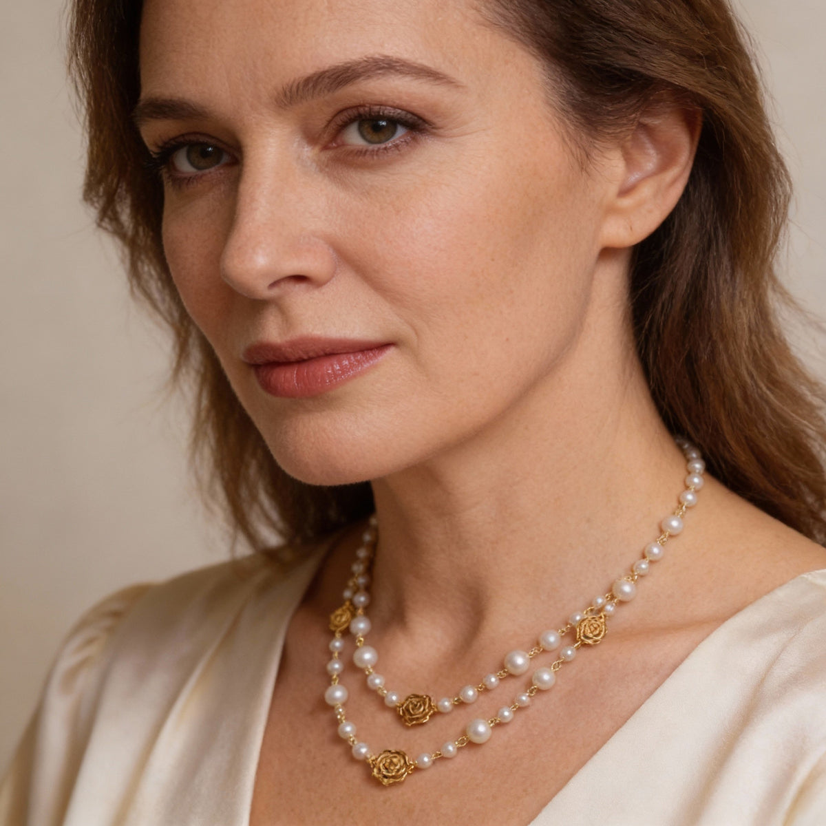Elegant Double-Row Pearl Necklace with Delicate Rose Details