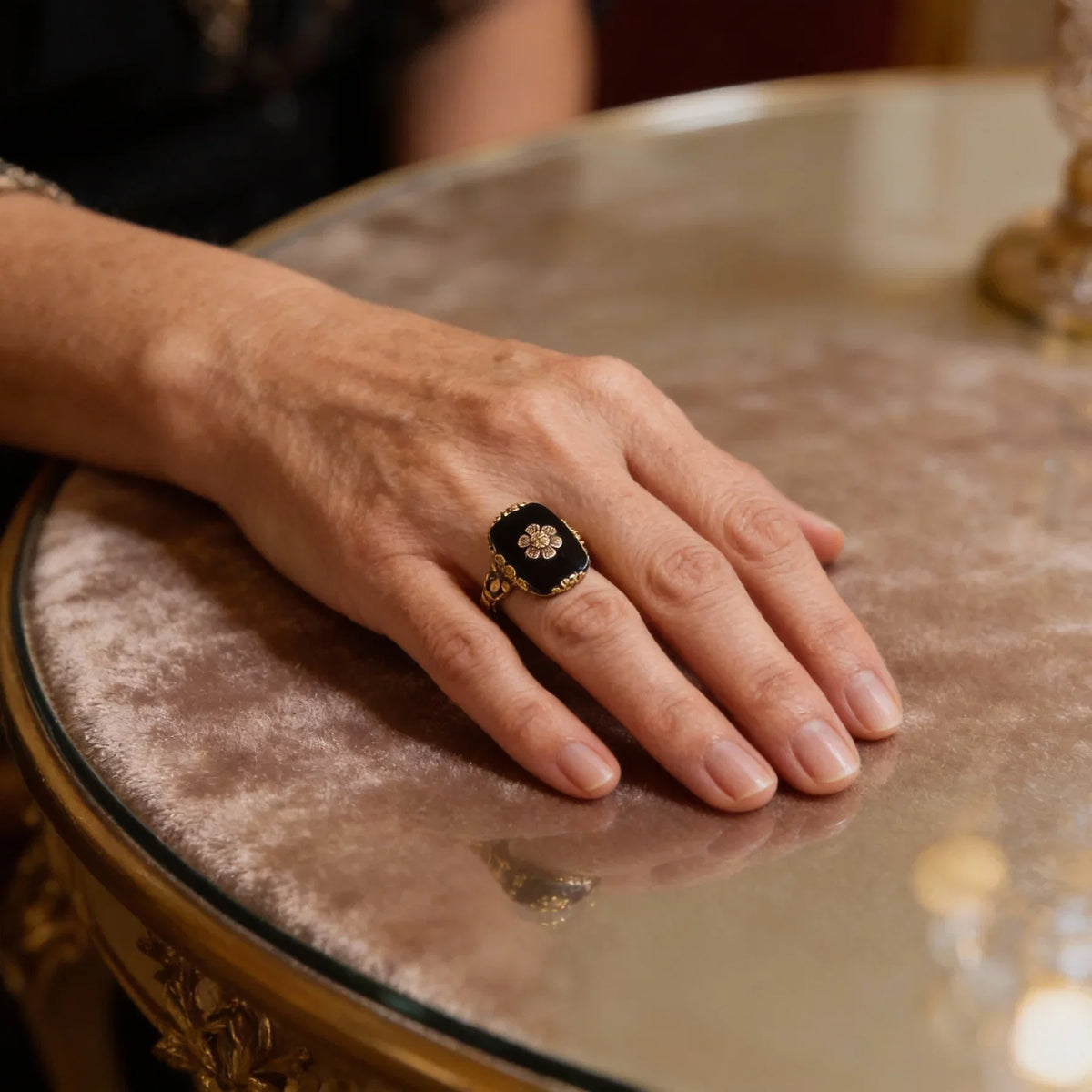 Vintage Ring with Black Stone and Gold Floral Details