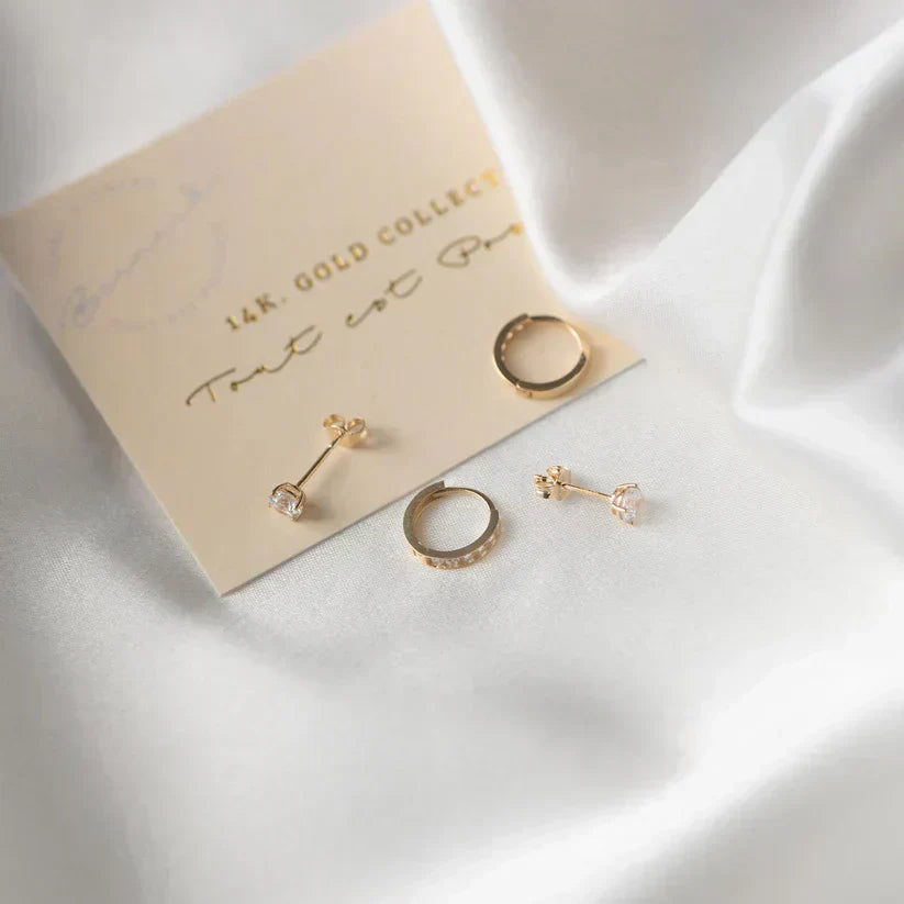 Earrings featuring sparkling cubic zirconia stones in a classic pointed setting