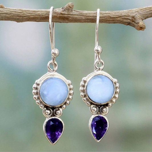 Moonstone earrings with amethyst teardrops and gemstone settings