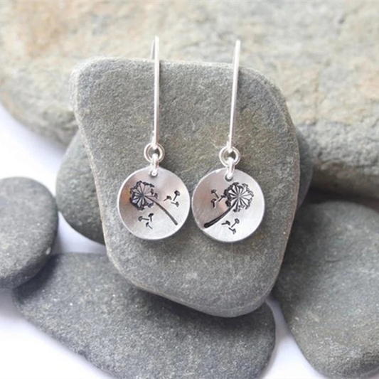 Hand-stamped dandelion earrings, featuring a delicate dandelion design