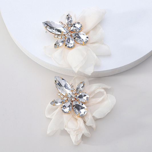 Glamorous earrings featuring rhinestones and delicate floral motifs