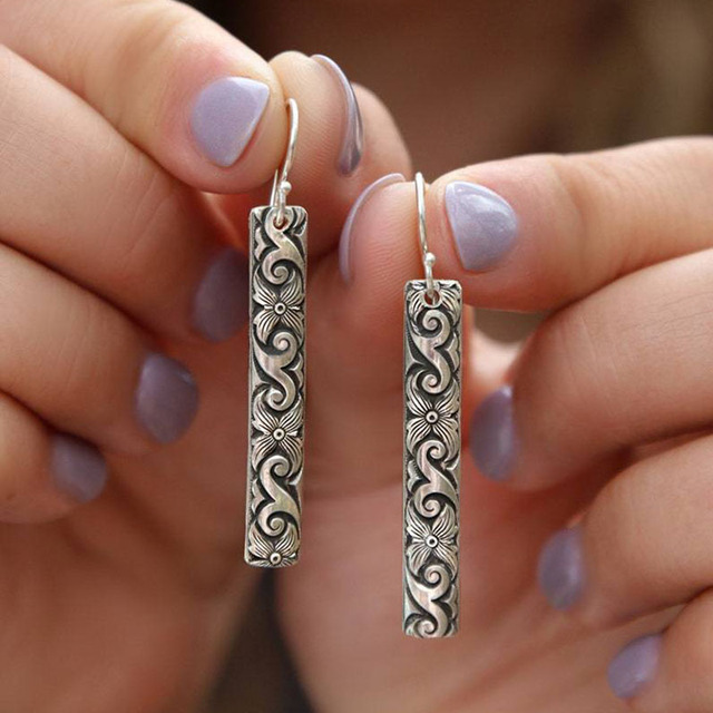 Boho-Chic Earrings with Floral and Wave Design