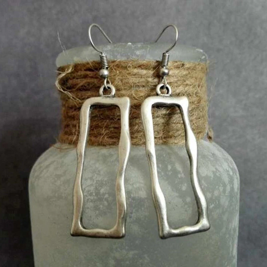 Modern geometric earrings with an antique finish for a boho look