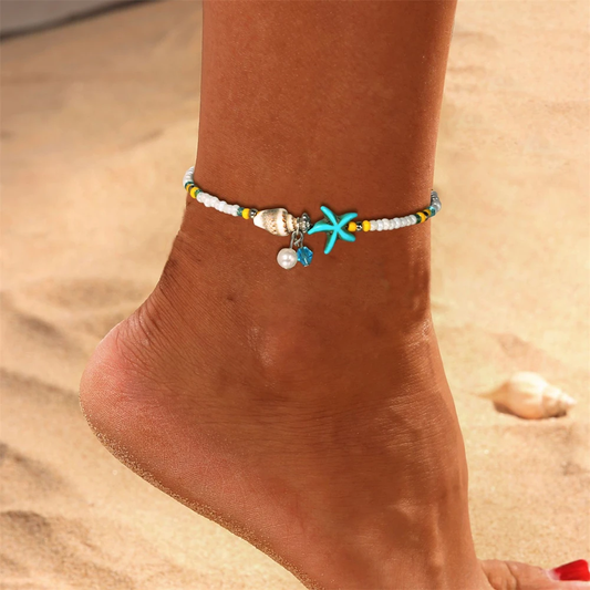 Beaded beach anklet with a starfish shell and pendants