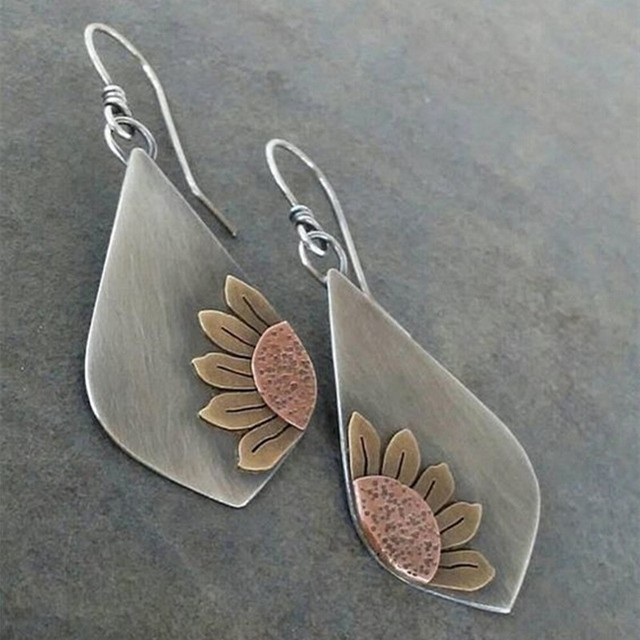 Handmade flower earrings made from hammered copper and brushed metal