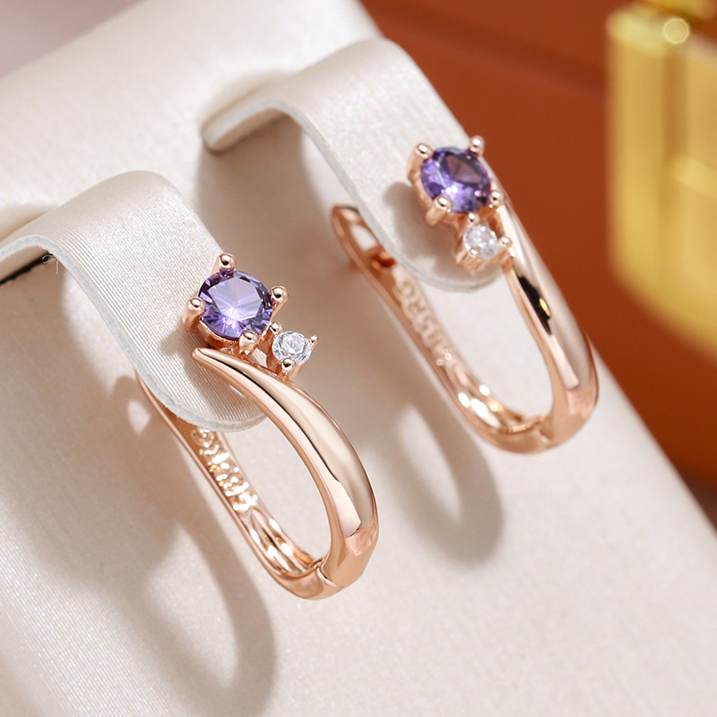 Elegant rose gold-plated earrings with purple cubic zirconia and gemstones