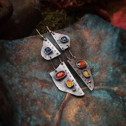 Handmade earrings with blue gemstones and amber