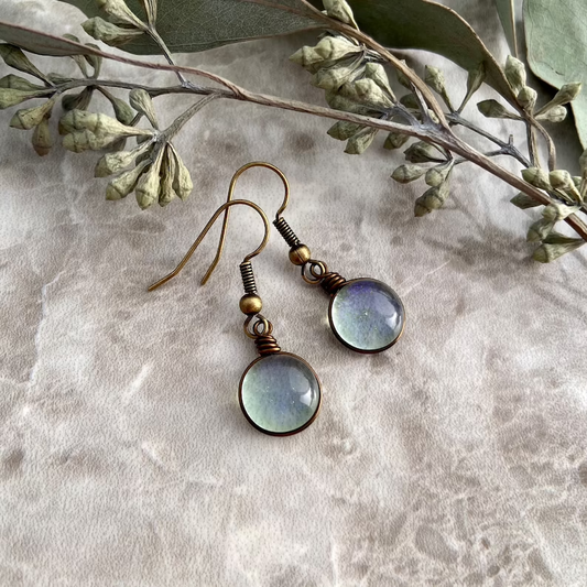 Sparkling crystal bead earrings with a delicate moonstone effect