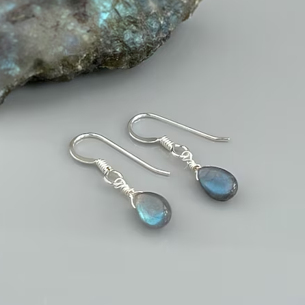 Teardrop-shaped labradorite earrings with a pendant featuring sparkling gemstones