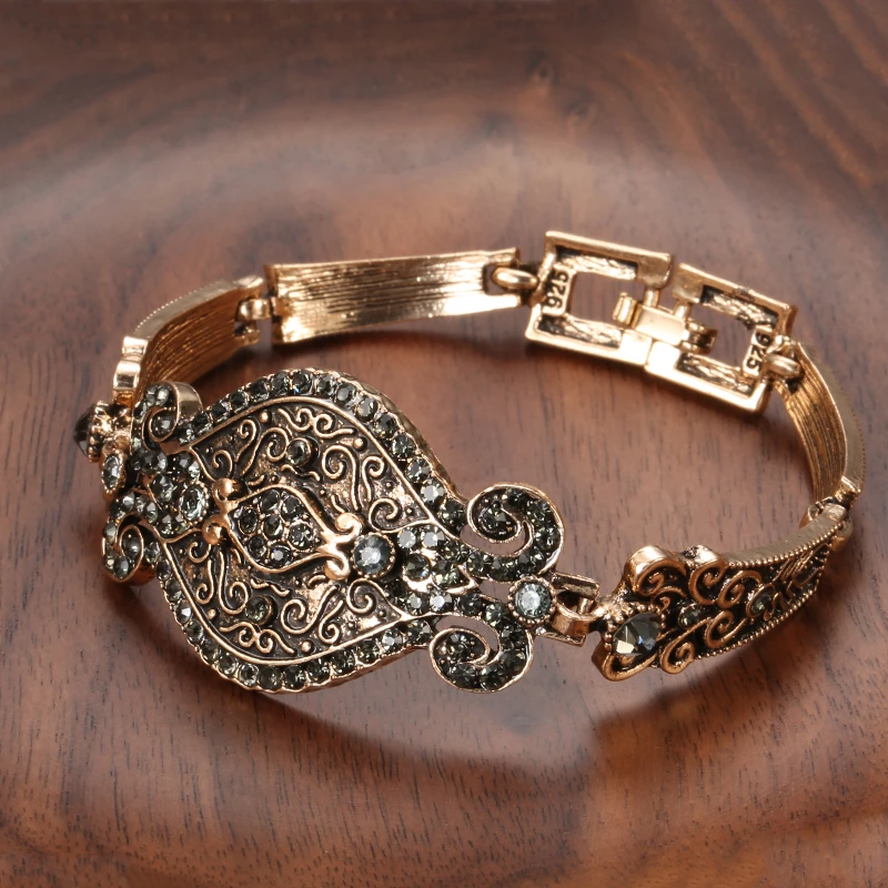 Antique bracelet with filigree detailing and black crystals