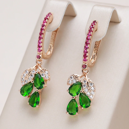 Elegant earrings featuring sparkling ruby drops and emerald-green cubic zirconia stones