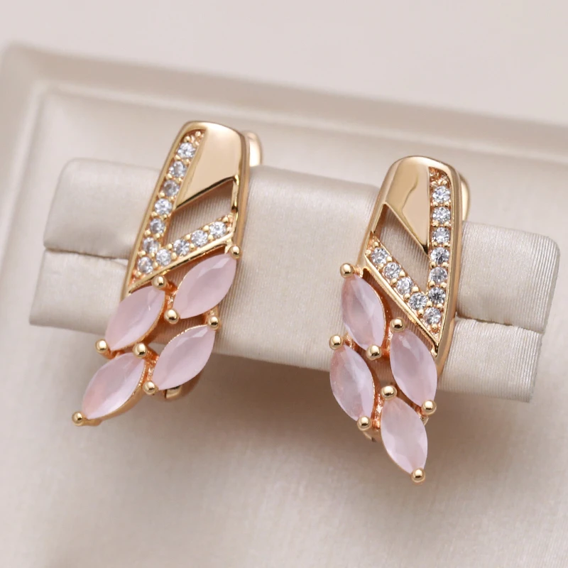 Elegant earrings featuring pink marquise-cut crystals and cubic zirconia