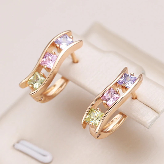 Wavy earrings with coloured cubic zirconia stones