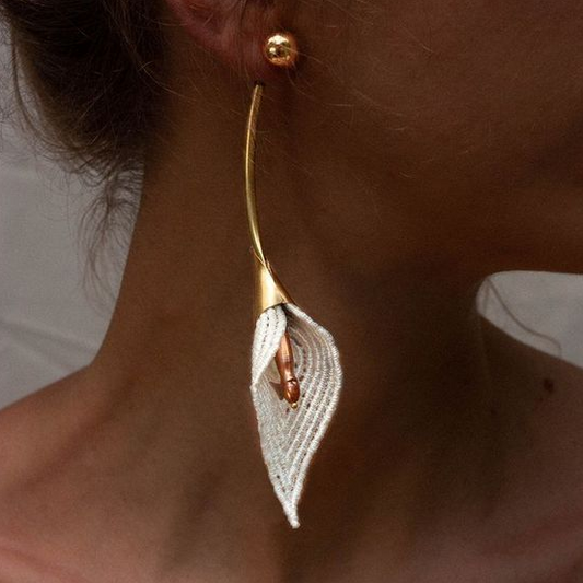 Elegant flower earrings with delicate white foliage and a stem
