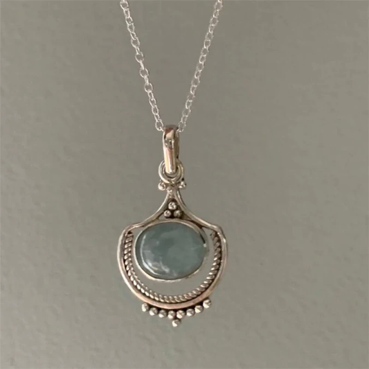 Vintage Necklace with Sky Blue Stone and Ornate Details