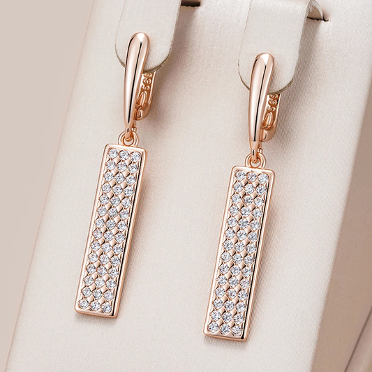 Elegant rose gold-coloured earrings with brilliant-cut cubic zirconia stones