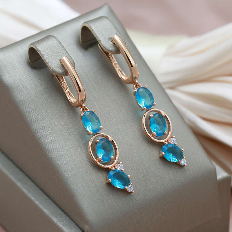 Elegant earrings with blue cubic zirconia stones that look like roses