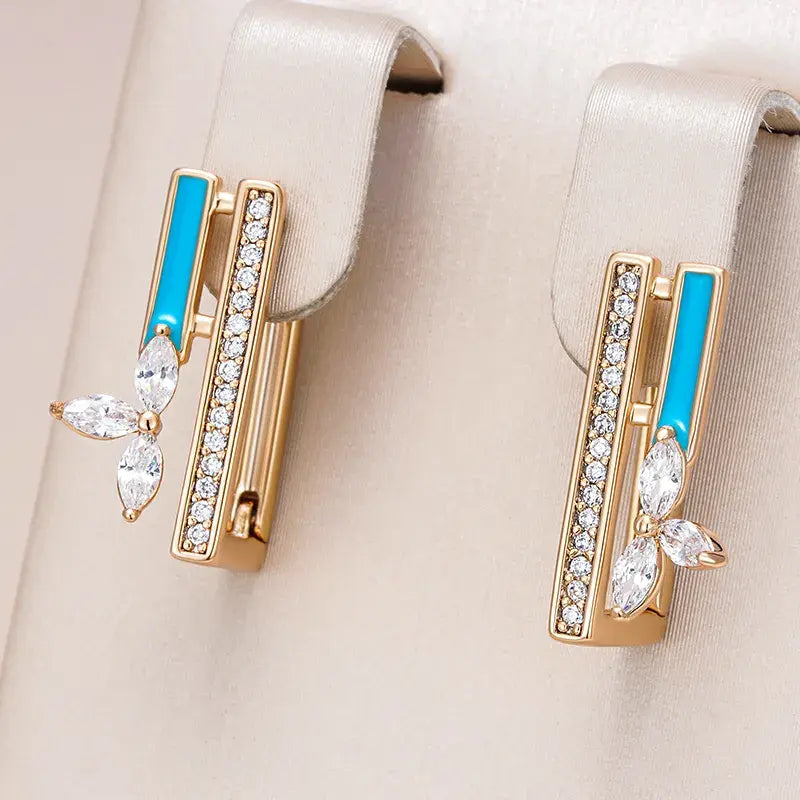 Elegant earrings with turquoise-blue enamel and sparkling cubic zirconia stones