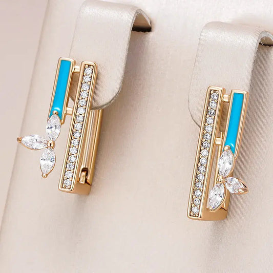 Elegant earrings with turquoise-blue enamel and sparkling cubic zirconia stones