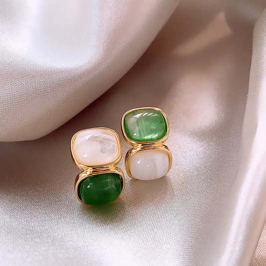Elegant earrings with decorative green and white stones