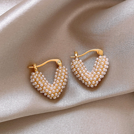 Elegant heart-shaped hoop earrings with pearls for a touch of elegance