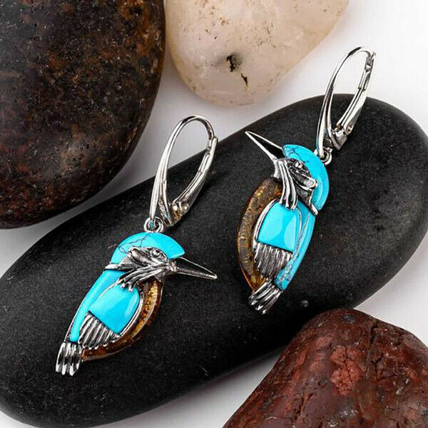 Turquoise blue bird earrings with an animal motif and an elegant design
