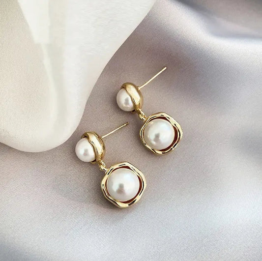 Elegant Dangle Earrings with Pearls and Wavy Frame