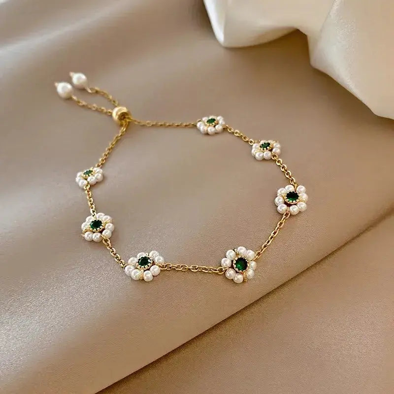 Elegant pearl flower bracelet with sparkling cubic zirconia stones