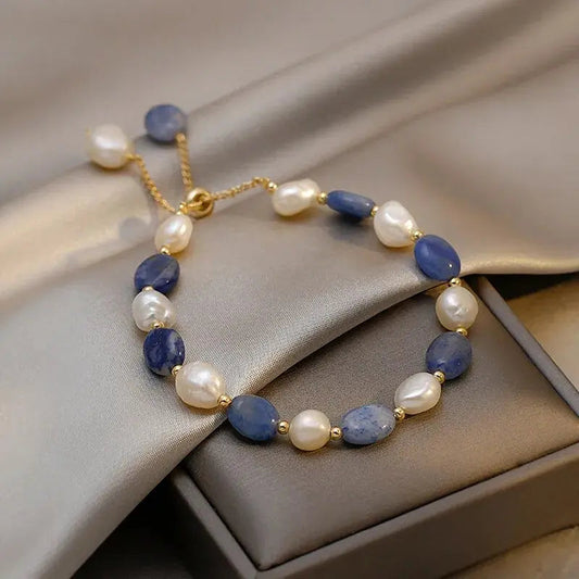 An elegant bracelet featuring freshwater pearls and sodalite gemstones
