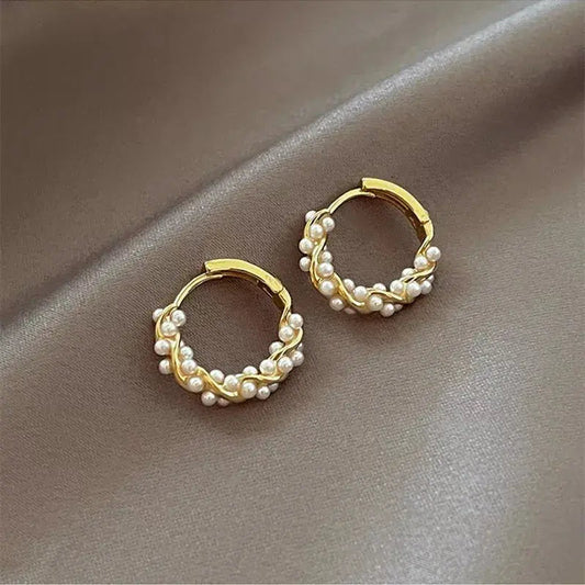 Curved Earrings with Elegant Pearl Details