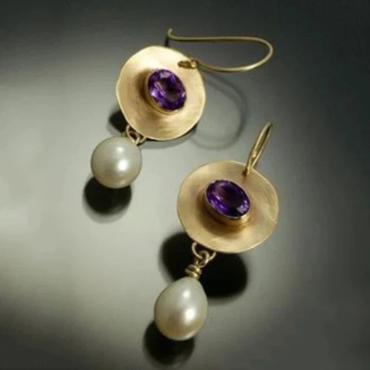 Elegant earrings featuring amethyst and teardrop-shaped freshwater pearls