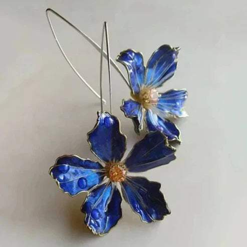 Elegant blue flower earrings with decorative pearls
