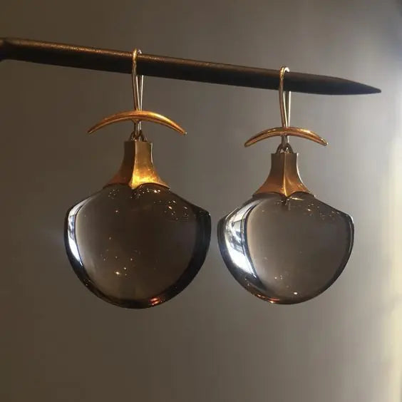 Stylish earrings featuring smoky quartz and elegant brass detailing