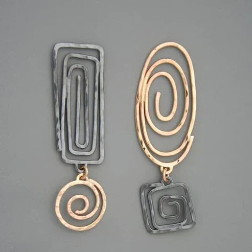 Modern two-tone geometric spiral earrings with a hammered finish