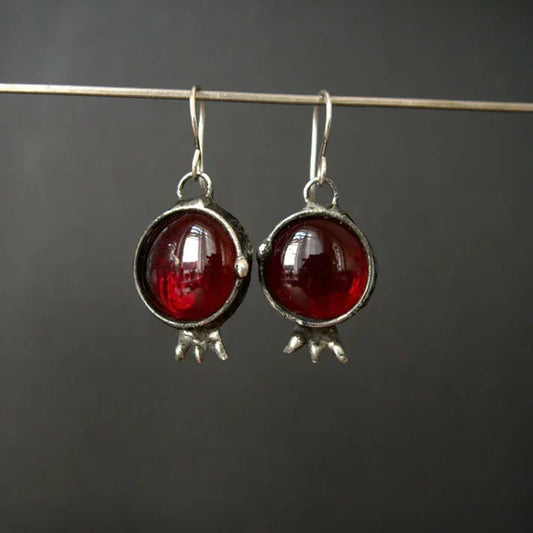 Vintage pomegranate earrings with red crystal drops and an antique design