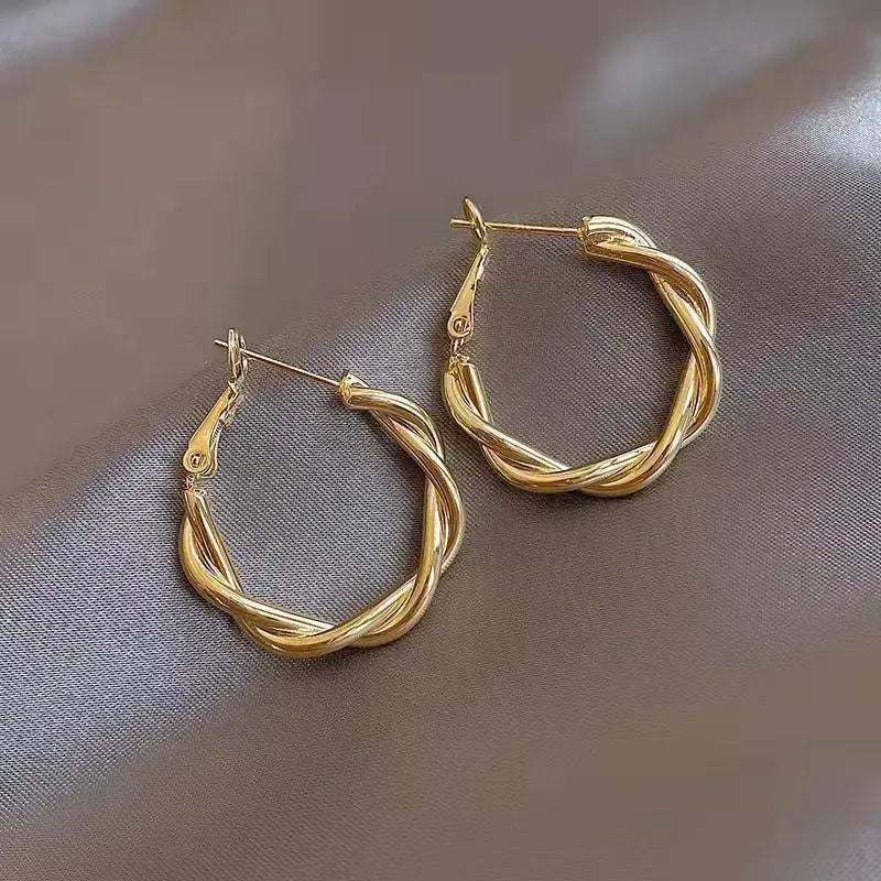 Twisted hoop earrings with a cord design